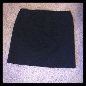 Fitted black mini skirt